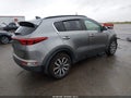 2018 Kia Sportage — photo 4 of 17 | VIN KNDPNCAC4J7390412