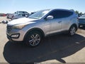 2013 Hyundai Santa Fe — photo 2 of 16 | VIN 5XYZWDLA2DG044647