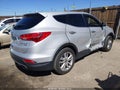 2013 Hyundai Santa Fe — photo 4 of 16 | VIN 5XYZWDLA2DG044647