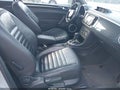 2012 Volkswagen Beetle — photo 3 of 13 | VIN 3VWVA7AT2CM660222