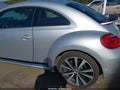 2012 Volkswagen Beetle — photo 4 of 13 | VIN 3VWVA7AT2CM660222