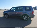 2014 Honda Pilot — photo 14 of 16 | VIN 5FNYF4H51EB005533
