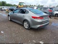 2016 Kia Optima — photo 3 of 15 | VIN 5XXGT4L34GG027763