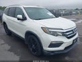 2016 Honda Pilot — photo 6 of 19 | VIN 5FNYF6H59GB079667