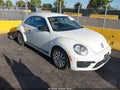 2018 Volkswagen Beetle — photo 1 of 17 | VIN 3VWFD7AT1JM702775