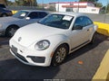 2018 Volkswagen Beetle — photo 2 of 17 | VIN 3VWFD7AT1JM702775
