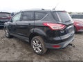 2014 Ford Escape — photo 3 of 11 | VIN 1FMCU9JXXEUE23228