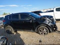 2020 Kia Sportage — photo 14 of 17 | VIN KNDPM3AC9L7677038