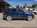 2015 Honda CR-V — photo 13 of 16 | VIN 3CZRM3H53FG704057