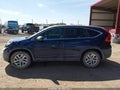 2015 Honda CR-V — photo 14 of 16 | VIN 3CZRM3H53FG704057