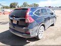 2015 Honda CR-V — photo 4 of 16 | VIN 3CZRM3H53FG704057