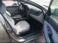 2012 Kia Optima — photo 5 of 11 | VIN 5XXGM4A75CG038610