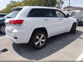 2015 Jeep Grand Cherokee — photo 4 of 16 | VIN 1C4RJECGXFC952358