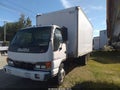 1999 Isuzu NPR — photo 1 of 12 | VIN 4KLC4B1R4XJ004308