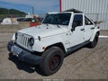 2015 Jeep Wrangler Unlimited — photo 2 of 19 | VIN 1C4BJWEG2FL767144