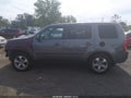 2014 Honda Pilot — photo 14 of 16 | VIN 5FNYF4H56EB012414
