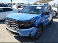 2024 Honda Passport — photo 2 of 22 | VIN 5FNYF8H69RB017483