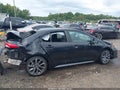 2021 Toyota Corolla — photo 12 of 15 | VIN 5YFS4MCE4MP064856