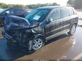 2013 Volkswagen Tiguan — photo 2 of 19 | VIN WVGAV3AX9DW573917
