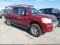2004 Nissan Titan — photo 1 of 11 | VIN 1N6AA07B34N504234
