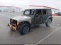 2010 Jeep Wrangler Unlimited — photo 2 of 11 | VIN 1J4BZ3H1XAL156988