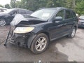 2011 Hyundai Santa Fe — photo 2 of 15 | VIN 5XYZKDAG9BG026131