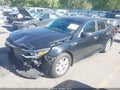 2016 Kia Optima — photo 2 of 16 | VIN 5XXGT4L34GG116331