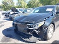 2016 Kia Optima — photo 6 of 16 | VIN 5XXGT4L34GG116331