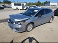 2018 Subaru Impreza — photo 2 of 16 | VIN 4S3GTAA69J3715082