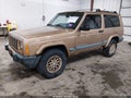 1999 Jeep Cherokee — photo 2 of 20 | VIN 1J4FF67S9XL574540
