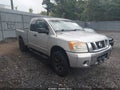 2009 Nissan Titan — photo 1 of 11 | VIN 1N6AA06C69N313523