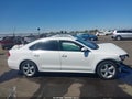 2015 Volkswagen Passat — photo 13 of 16 | VIN 1VWBT7A37FC006433