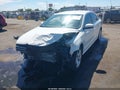 2015 Volkswagen Passat — photo 2 of 16 | VIN 1VWBT7A37FC006433