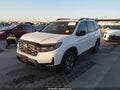 2023 Honda Passport — photo 2 of 17 | VIN 5FNYF8H67PB019570