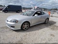2005 Hyundai Tiburon — photo 2 of 12 | VIN KMHHN65F15U186812