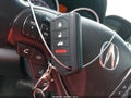 2011 Acura TL — photo 11 of 17 | VIN 19UUA9F59BA001619