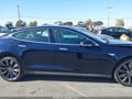 2014 Tesla Model S — photo 13 of 18 | VIN 5YJSA1H19EFP49901