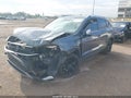 2024 Volkswagen Taos — photo 2 of 15 | VIN 3VVEX7B2XRM002343