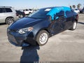 2015 Toyota Corolla — photo 2 of 16 | VIN 5YFBURHEXFP179468