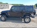 2013 Jeep Wrangler Unlimited — photo 14 of 16 | VIN 1C4BJWEG0DL689542
