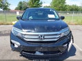 2018 Honda Pilot — photo 12 of 16 | VIN 5FNYF6H13JB042716