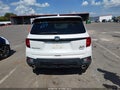 2023 Honda Passport — photo 17 of 22 | VIN 5FNYF8H08PB000358