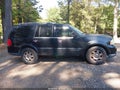 2005 Lincoln Navigator — photo 13 of 16 | VIN 5LMFU28585LJ01859