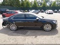 2016 Volkswagen Passat — photo 13 of 16 | VIN 1VWCM7A38GC006265
