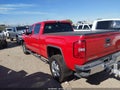 2015 GMC Sierra — photo 14 of 16 | VIN 1GT12ZE8XFF601911