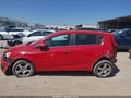 2013 Chevrolet Sonic — photo 13 of 15 | VIN 1G1JE6SH1D4177594
