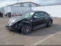 2016 Volkswagen Beetle — photo 2 of 17 | VIN 3VWS17AT6GM618144