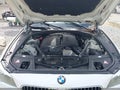 2014 BMW 5 Series — photo 10 of 16 | VIN WBA5B1C58ED481173