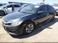 2016 Honda Civic — photo 2 of 16 | VIN 19XFC2F59GE040546
