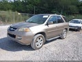 2004 Acura MDX — photo 2 of 16 | VIN 2HNYD18604H516263